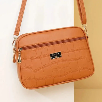 🔥👜Nová módní dámská crossbody kabelka 2025 brzy na jaře ---velká kapacita, jednoduchý styl, nastavitelný ramenní popruh